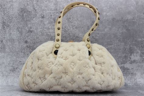 louis vuitton mink fur demi lune|Louis Vuitton Limited Edition Mink Cabochons Demi Lune Bag.